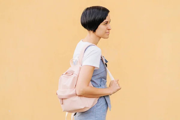 Portrait Young Woman Backpack Pale Yellow Wall — Stock Photo, Image