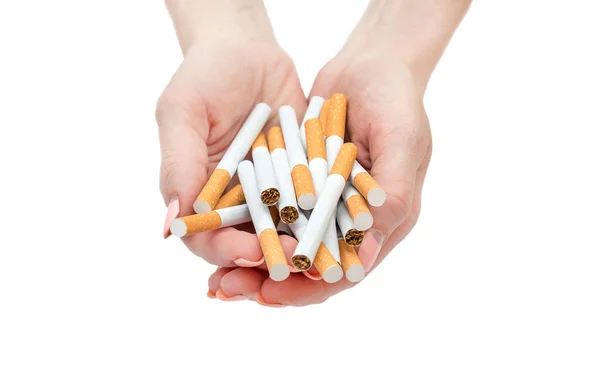 Žena Držící Dlaních Mnoho Cigaret Zavřít Izolováno Bílém — Stock fotografie