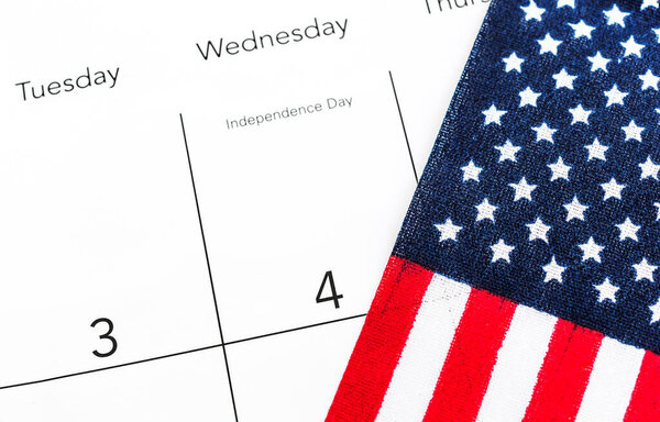 American flag on calendar. Close up. 4 july - USA independence day.