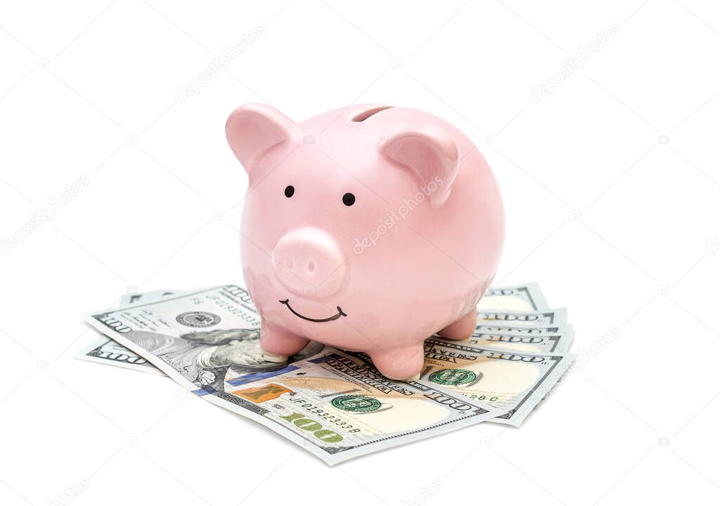 Piggy bank with money on white background. 