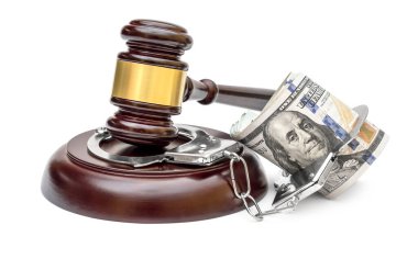 Yargıç tokmağı, kelepçe ve beyaza para.