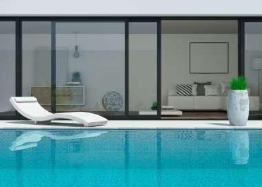 Havuzu ve güneşliği olan modern bir villa.