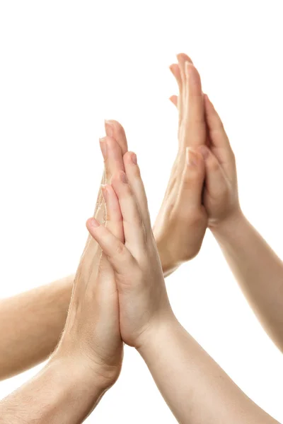 Female hand holding a childs palm isolated on white background. Copy space — Stock Photo, Image