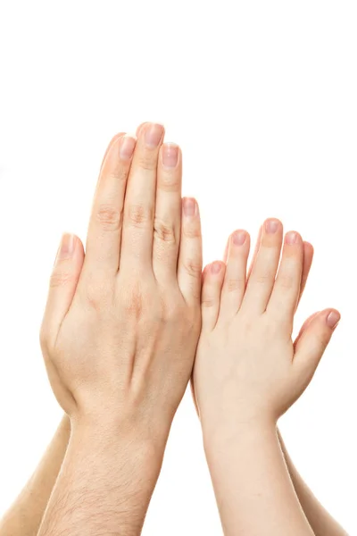 Womens and childrens palms are folded in a gesture of prayer isolated on white background. Copy space — Stock Photo, Image