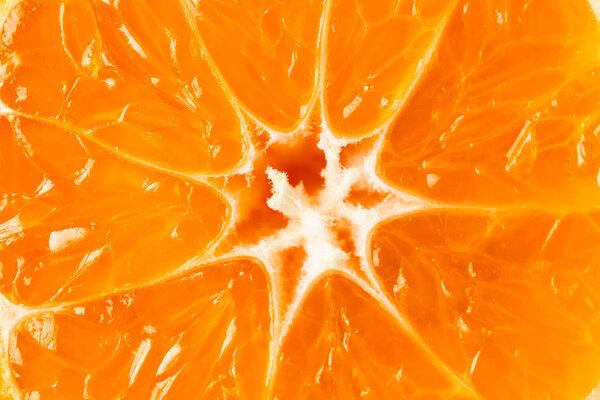 Bright, juicy food background, close-up of orange pulp.