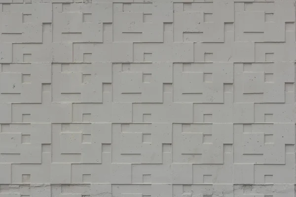Szara ściana betonowa z geometrycznym wzorem tła — Zdjęcie stockowe