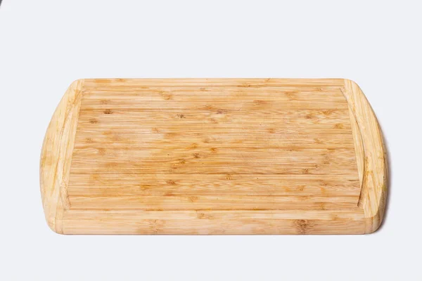 Cozinha placa de corte de madeira isolada no fundo branco — Fotografia de Stock