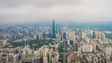 Gün saat aydınlatma shenzhen şehir merkezinde trafik sokak Kavşak üstten görünüm 4k Çin