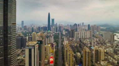 Gün saat aydınlatma shenzhen şehir merkezinde trafik sokak Kavşak üstten görünüm 4k Çin