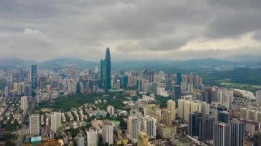 Gün saat aydınlatma shenzhen şehir merkezinde trafik sokak Kavşak üstten görünüm 4k Çin