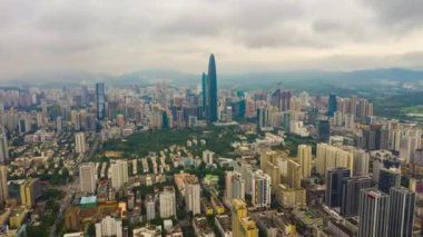 Gün saat aydınlatma shenzhen şehir merkezinde trafik sokak Kavşak üstten görünüm 4k Çin