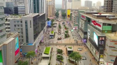 Gün saat aydınlatma shenzhen şehir merkezinde trafik sokak Kavşak üstten görünüm 4k Çin