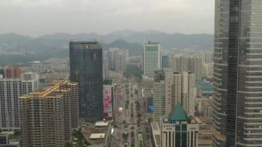 Gün saat aydınlatma shenzhen şehir merkezinde trafik sokak Kavşak üstten görünüm 4k Çin
