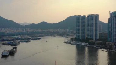 günbatımı zamanı ünlü sanya defne cityscape hava panorama 4k Çin