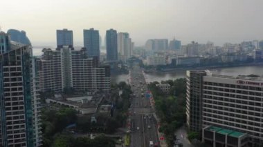 günbatımı zamanı ünlü sanya defne cityscape hava panorama 4k Çin