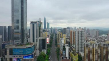 Gün saat aydınlatma shenzhen şehir merkezinde trafik sokak Kavşak üstten görünüm 4k Çin