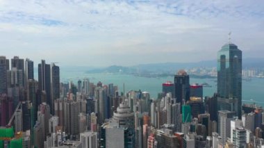 güneşli gün uçuş hong kong şehir cityscape hava panorama 4k üzerinde