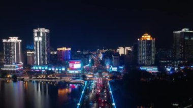 Gece aydınlatmalı Sanya Cityscape Panorama 4k Timelapse Hainan Island Çin