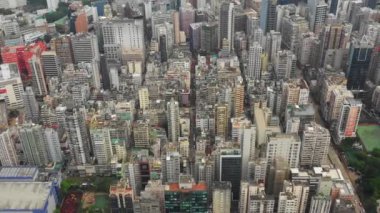 Gündüz kowloon cityscape hava topdown panorama 4 k hong kong uçuş.