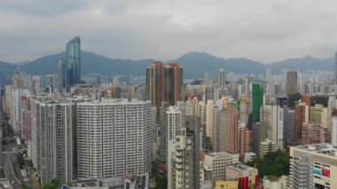 Gündüz kowloon cityscape hava panorama 4 k hong kong uçuş.