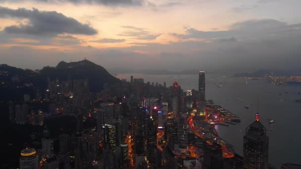 Night Time Illuminated Hong Kong Cityscape Downtown Victoria Harbour Aerial — Stock Video