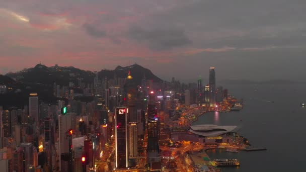 Night Time Illuminated Hong Kong Cityscape Downtown Victoria Harbour Aerial — Stock Video