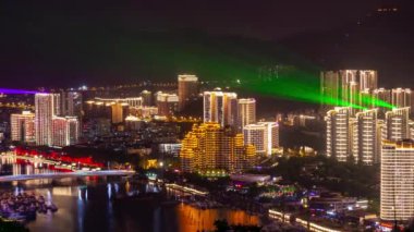 gece saat aydınlatma göstermek sanya nehir cityscape park üst panorama 4k timelapse hainan Adası Çin