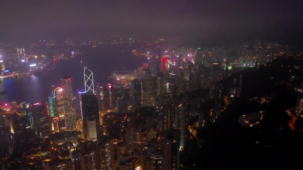 Night Time Illuminated Hong Kong Cityscape Downtown Victoria Harbour Aerial — Stock Video