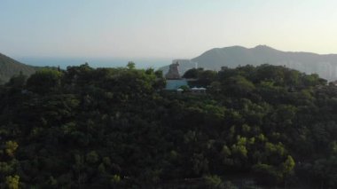 Akşam vakti Sanya City 'nin ünlü parkı gökyüzü manzarası 4k hainan çini