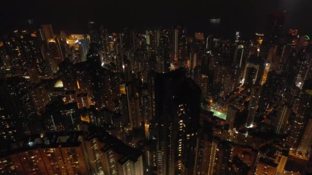 Night Time Illuminated Hong Kong Cityscape Downtown Victoria Harbour Aerial — Stock Video