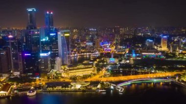 Alacakaranlık ışıklandırılmış Singapur şehir panoramik 4k Timelapse