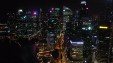 alacakaranlık aydınlatılmışsingapur cityscape arial panorama 4k görüntüleri