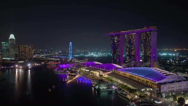 シンガポール 2019年2月4日 夜のシンガポールシティマリーナベイ有名なホテル空中パノラマ4K 2月4 2019シンガポール — ストック動画