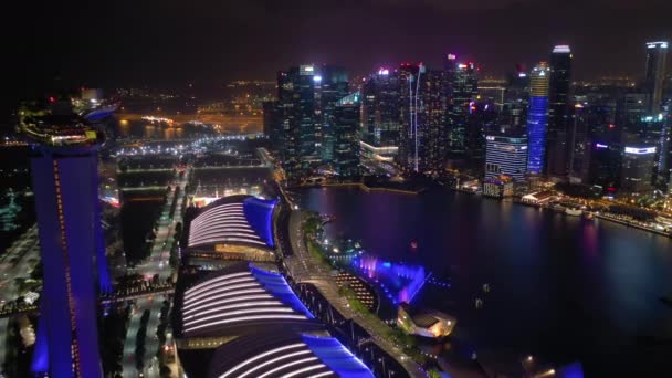 シンガポール 2019年5月 夜のマリーナベイを横切るシンガポールのダウンタウンのパノラマビュー — ストック動画