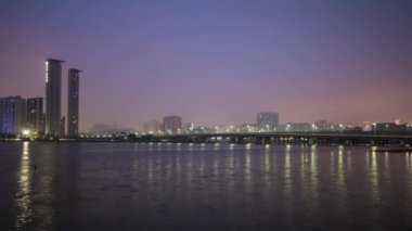 Night illuminated Macau Taipa island seascape panorama. 4k timelapse footage china