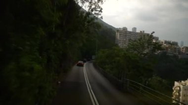 Gündüz vakti Hong Kong şehir manzarası, yol gezisi, pov panorama 4k