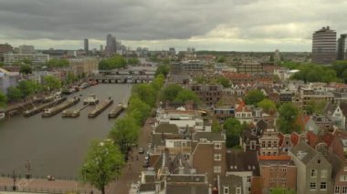 gün batımı Amsterdam şehir merkezi hava panorama 4k hollanda