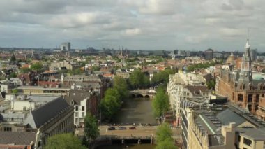 gün batımı Amsterdam şehir merkezi hava panorama 4k hollanda