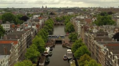 gün batımı Amsterdam şehir merkezi hava panorama 4k hollanda
