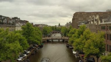 gün batımı Amsterdam şehir merkezi hava panorama 4k hollanda