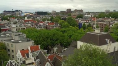 gün batımı Amsterdam şehir merkezi hava panorama 4k hollanda