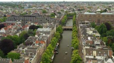gün batımı Amsterdam şehir merkezi hava panorama 4k hollanda