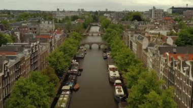 gün batımı Amsterdam şehir merkezi hava panorama 4k hollanda