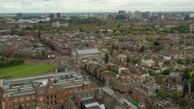 gün batımı Amsterdam şehir merkezi hava panorama 4k hollanda