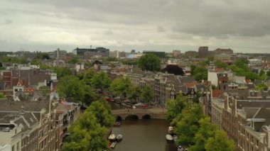 gün batımı Amsterdam şehir merkezi hava panorama 4k hollanda