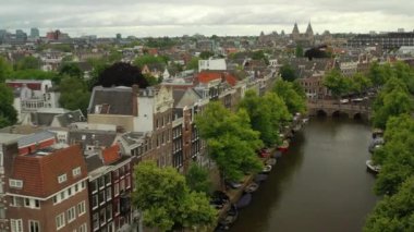 gün batımı Amsterdam şehir merkezi hava panorama 4k hollanda