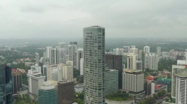 Singapur şehir havadan panorama 4k görüntüleri üzerinde gündüz uçuş