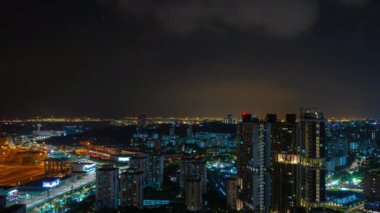 Singapur 'da gece aydınlatması, 4K, zaman atlaması  
