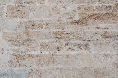 İspanya antika kumlu çizilmiş tuğla duvar. Doku eski tuğla