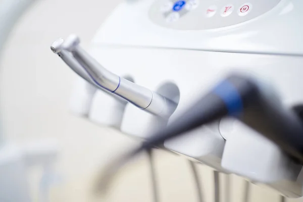 Air-driven dental turbines on the dentists treatment unit. Close up photo.